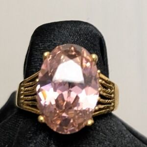 #111. Gold-Tone Ring with Pink Oval Gemstone
